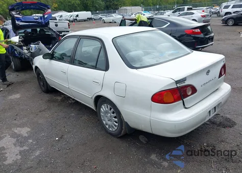 2001 Toyota Corolla Le z USA, uszkodzony, nr VIN 1NXBR12E41Z482121